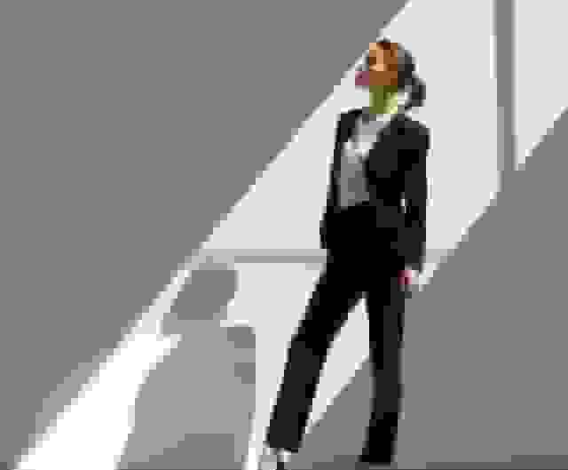 Profesional-headshot-woman-in-black-suit.jpeg