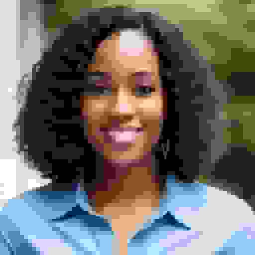 professional headshot of black woman with blue shirt